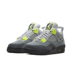 Jordan 4 Retro SE 95 Neon sneakers featuring grey upper with neon green accents and black sole.