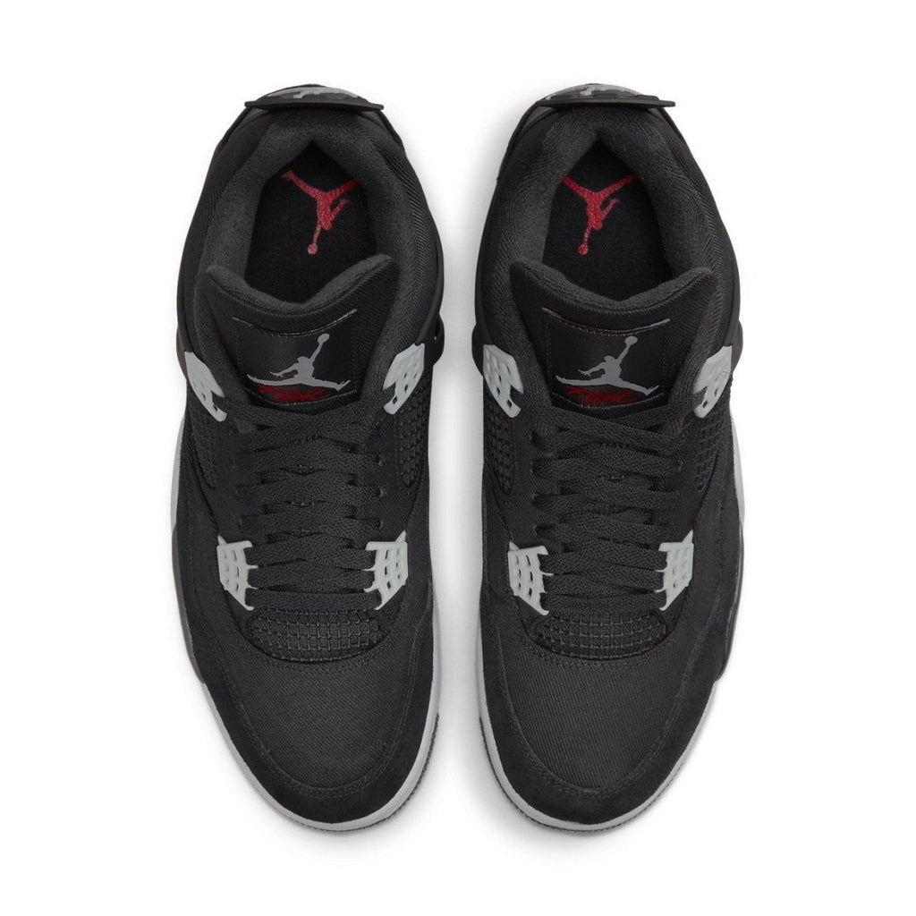 Jordan 4 Retro SE Black Canvas sneakers, featuring a black upper with grey detailing and red accents.