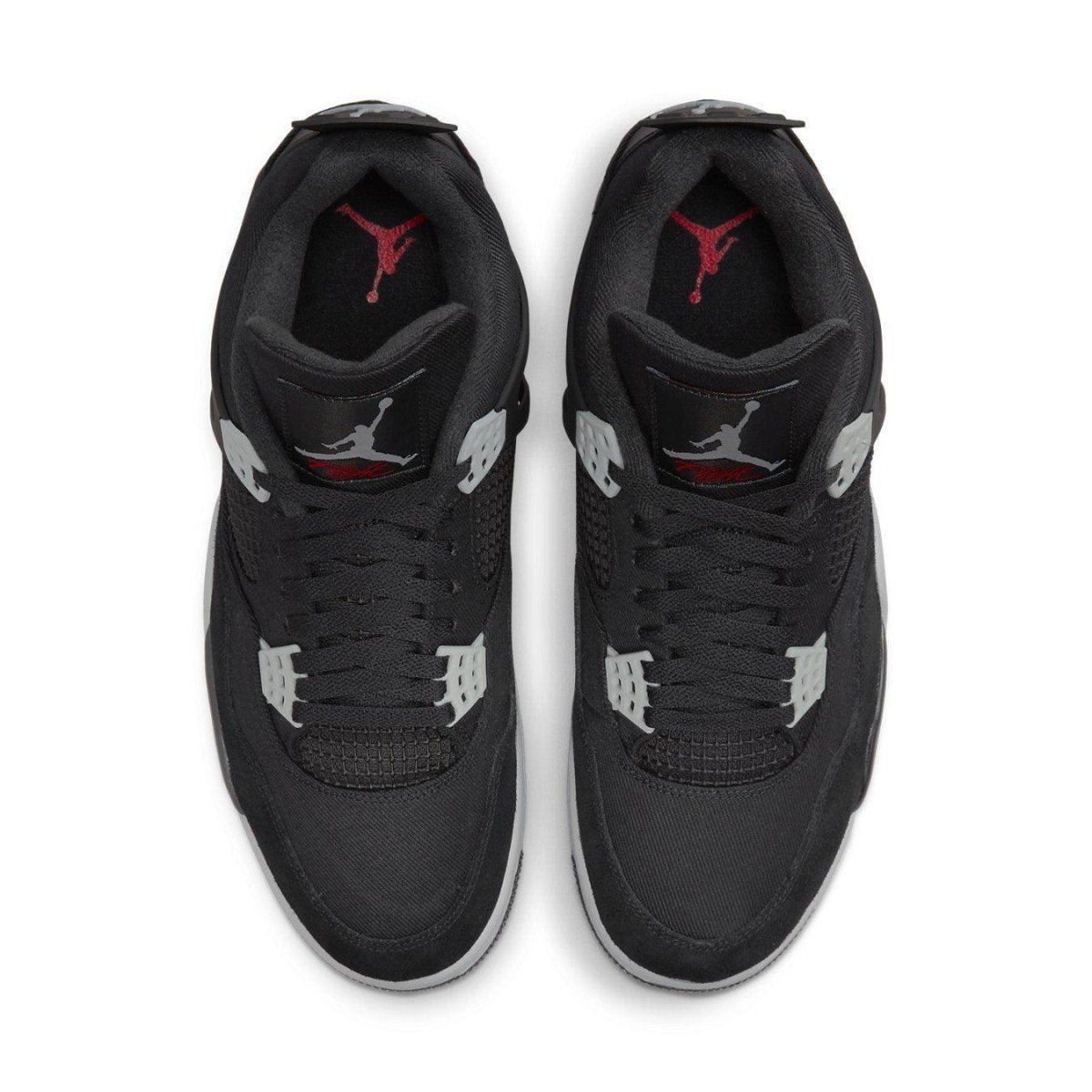 Jordan 4 Retro SE Black Canvas sneakers, featuring a black upper with grey detailing and red accents.