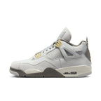 Air Jordan 4 Retro SE Craft Photon Dust in light gray suede and leather design, featuring unique texture and stylish silhouette.