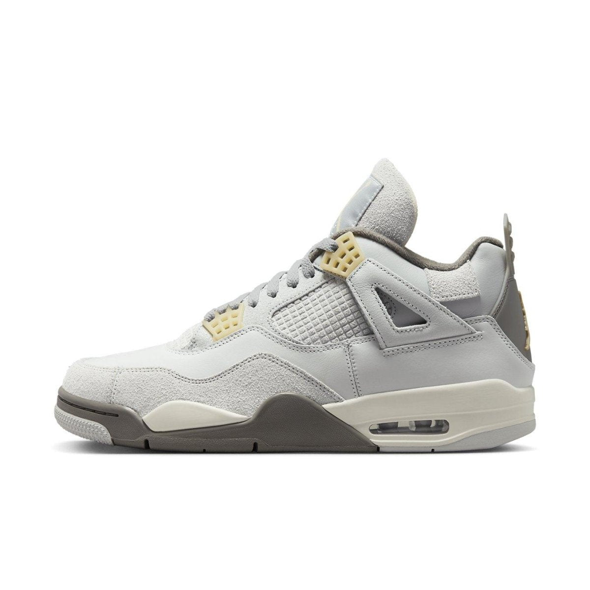 Air Jordan 4 Retro SE Craft Photon Dust in light gray suede and leather design, featuring unique texture and stylish silhouette.