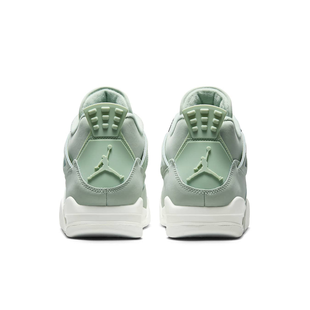 Jordan 4 Retro Seafoam Sail women's sneakers, featuring a mint green and white design from the back view.