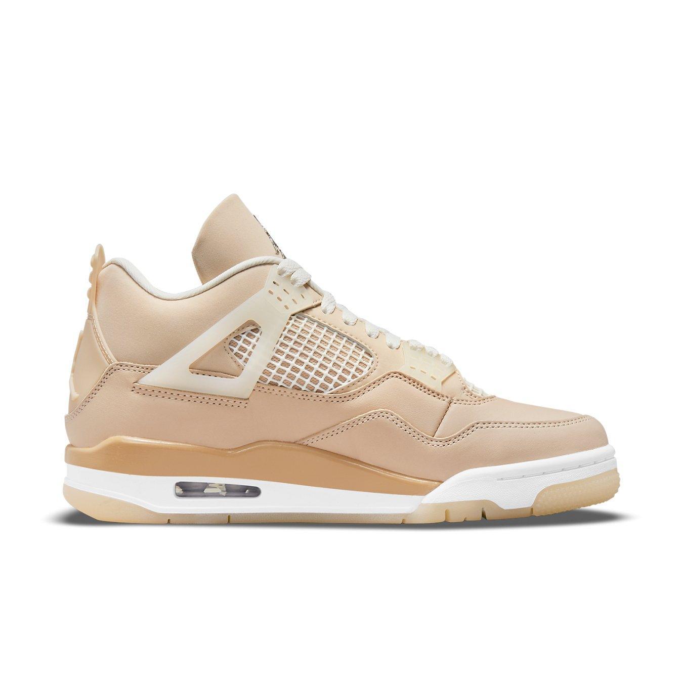 Women’s Jordan 4 Retro Shimmer sneaker in beige with distinctive mesh panels and classic silhouette.