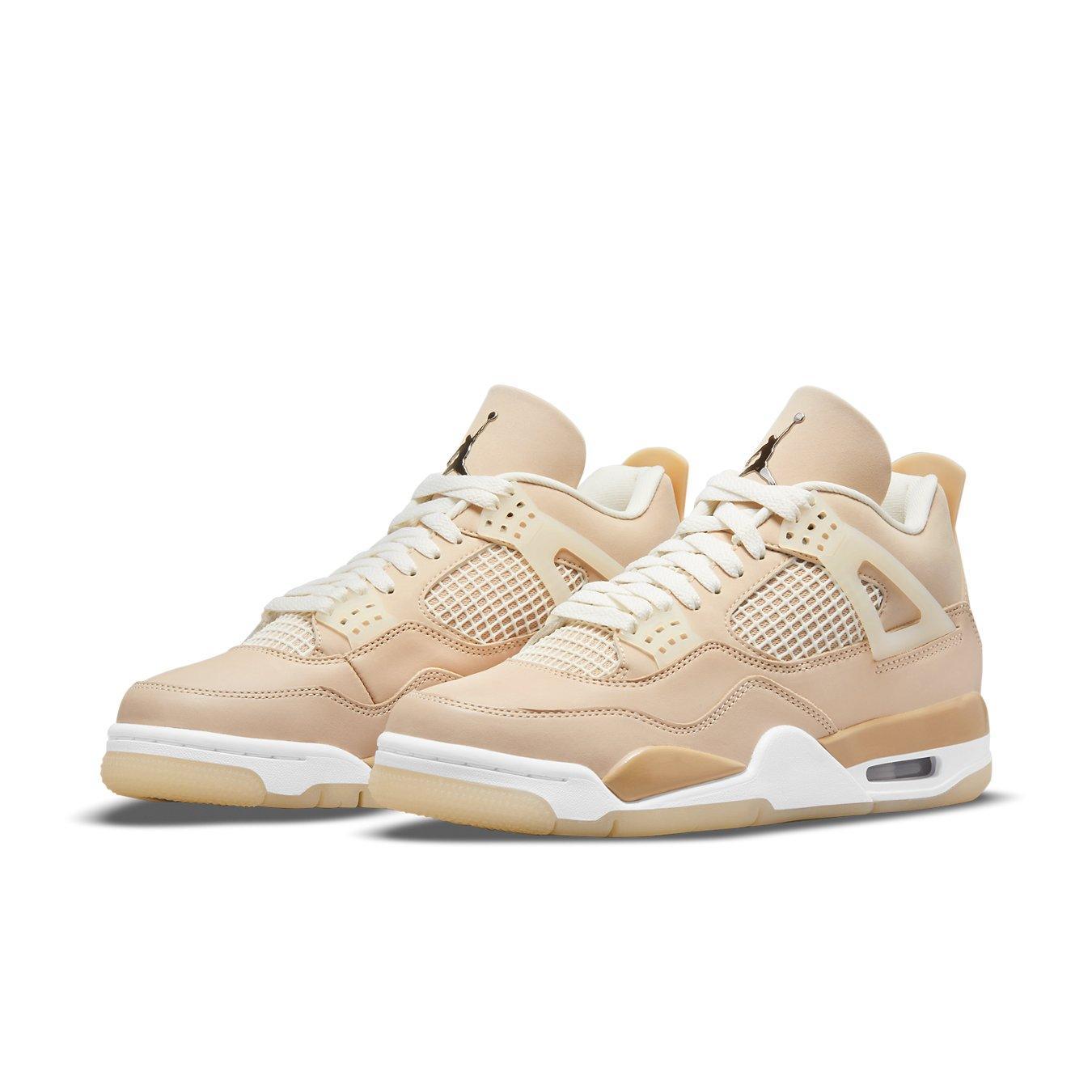 Jordan 4 Retro Shimmer women's sneakers with beige colorway and mesh paneling.
