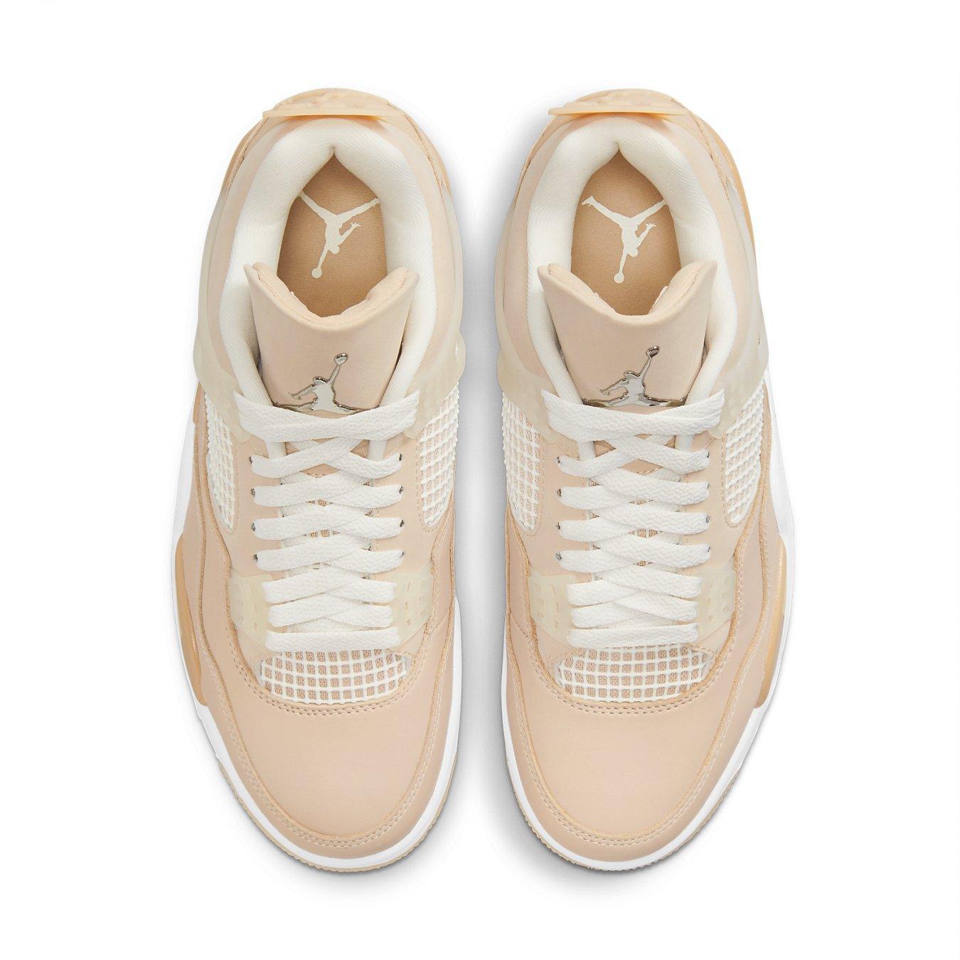 Air Jordan 4 Retro Shimmer Women's sneakers in peach tones with mesh panels and iconic logo.