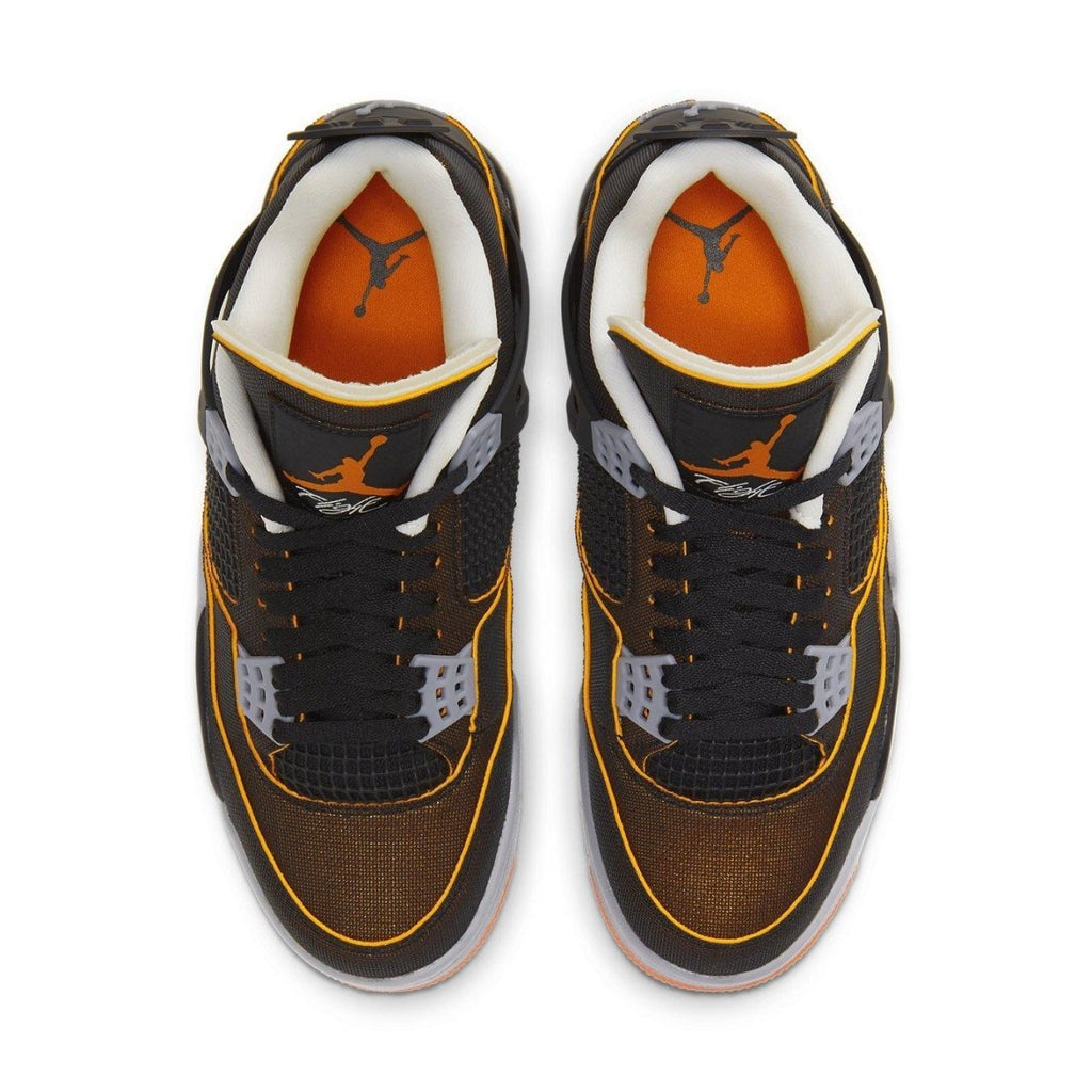 Top view of women's Air Jordan 4 Retro 'Starfish' sneaker featuring black mesh upper and vibrant orange accents.