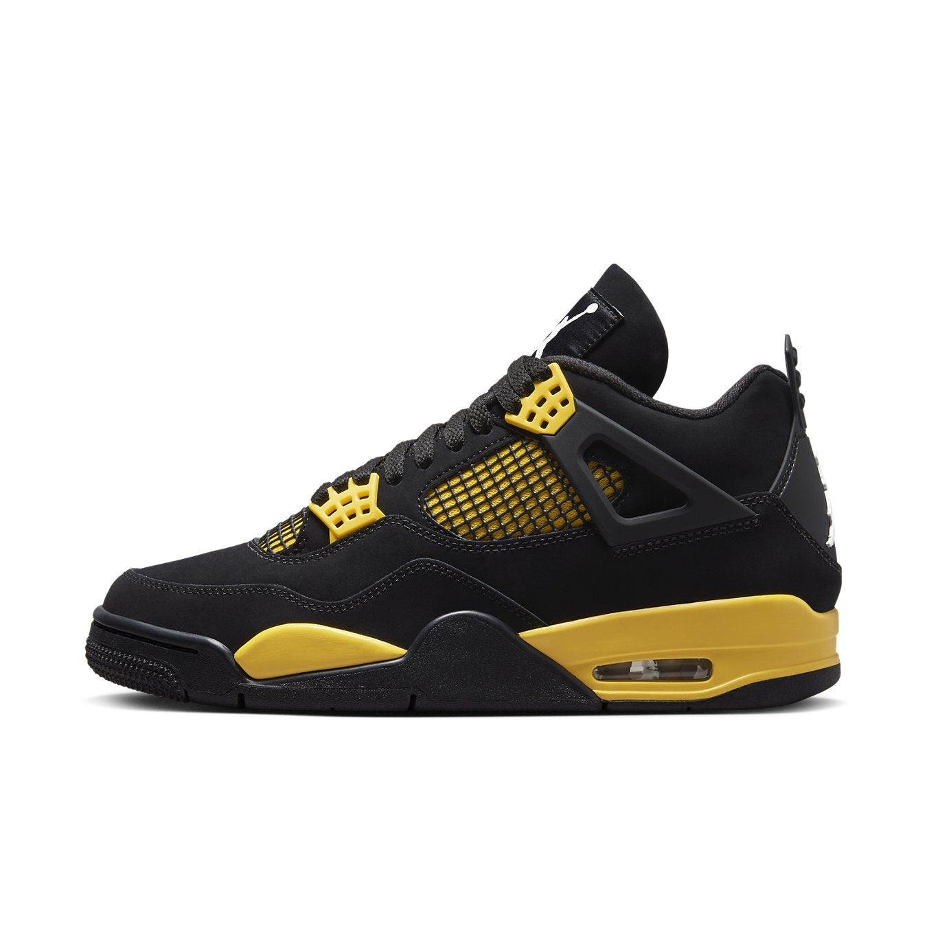 Jordan 4 Retro Thunder (2023) sneakers featuring black nubuck upper with yellow accents and mesh detailing.