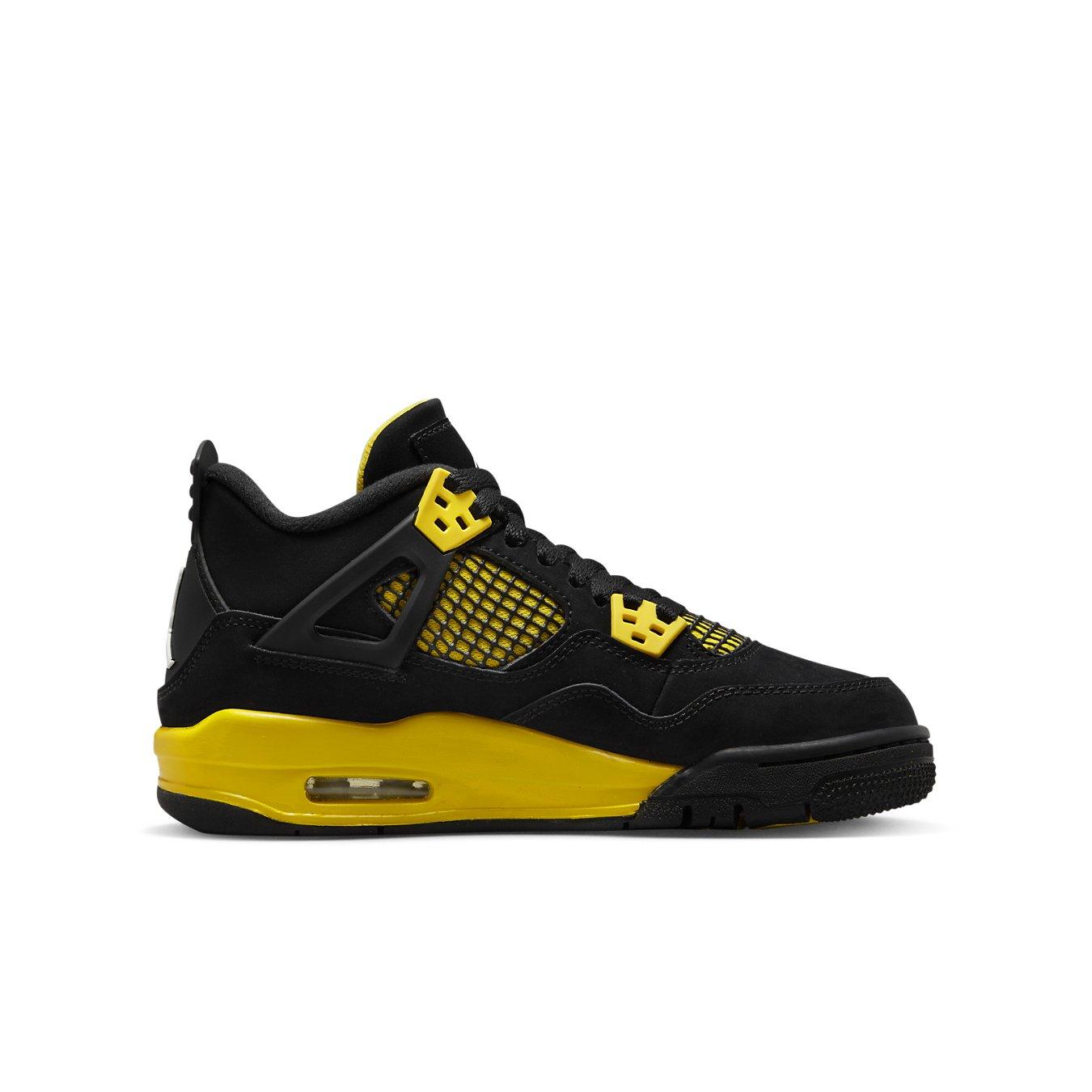 Air Jordan 4 Retro Thunder (2023) GS in black and yellow with nubuck upper and mesh detailing.