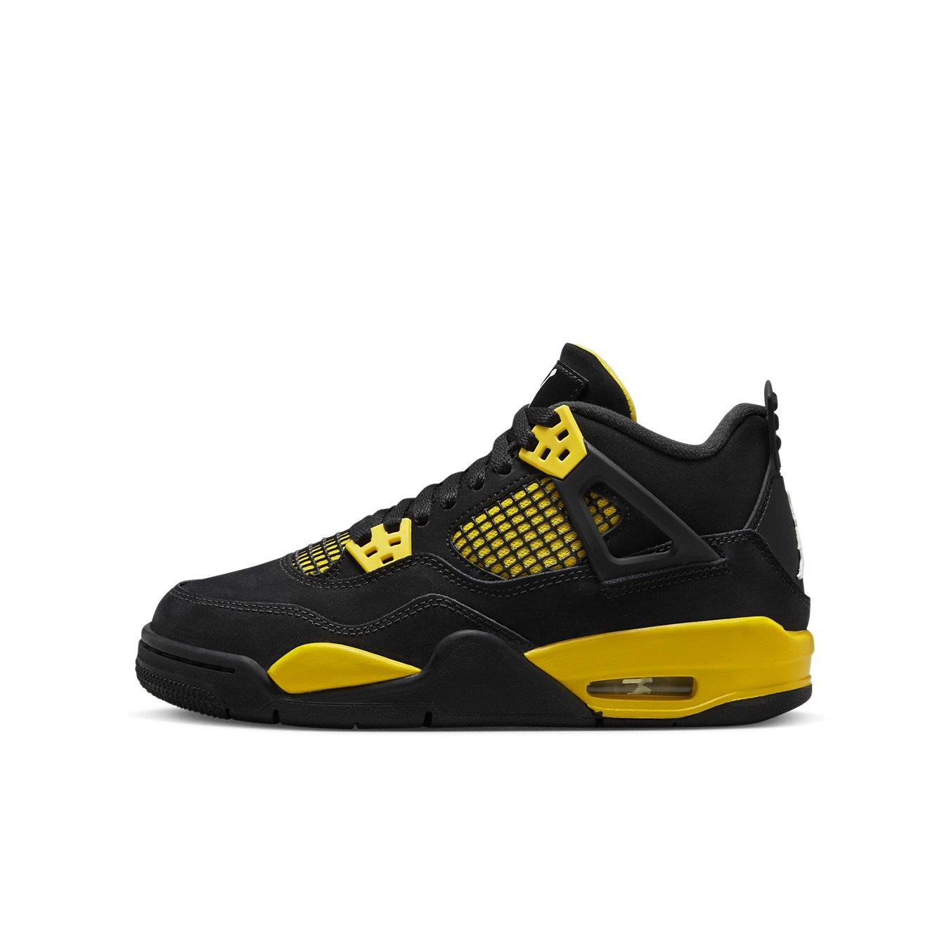 Air Jordan 4 Retro Thunder (2023) GS in black and yellow with nubuck upper and mesh details.