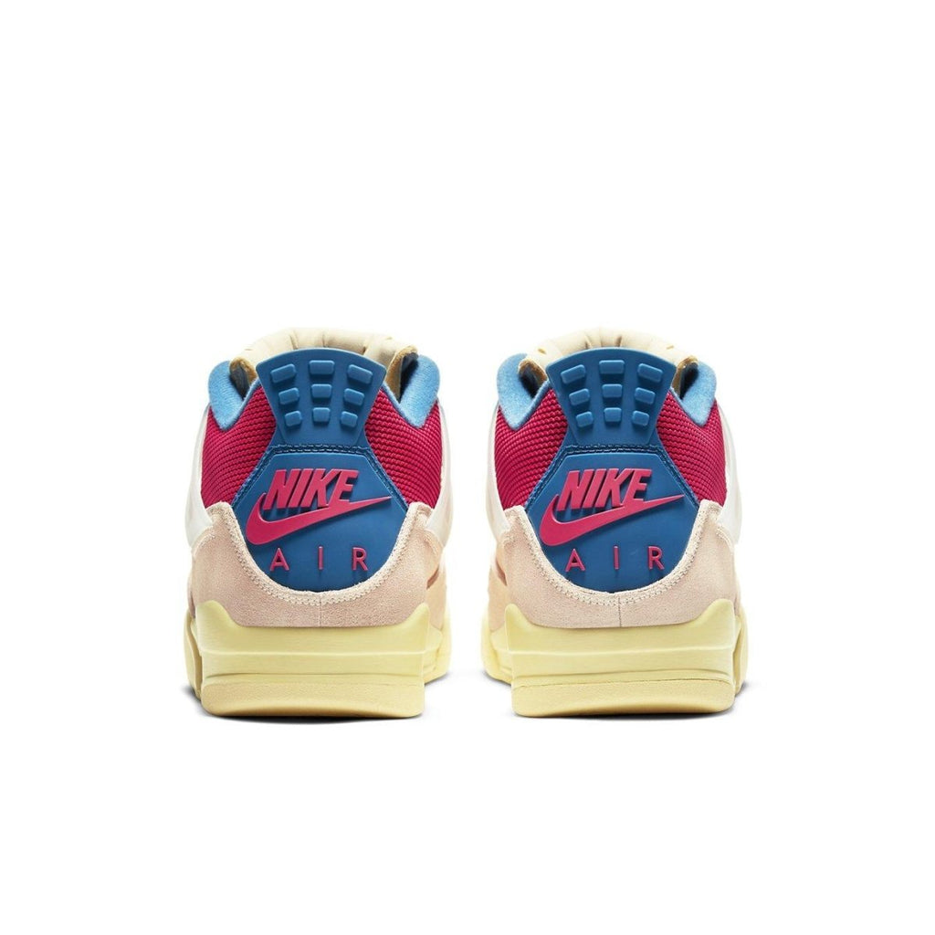 Back view of Nike Air Jordan 4 Retro Union Guava Ice sneakers featuring vibrant pink and blue details.