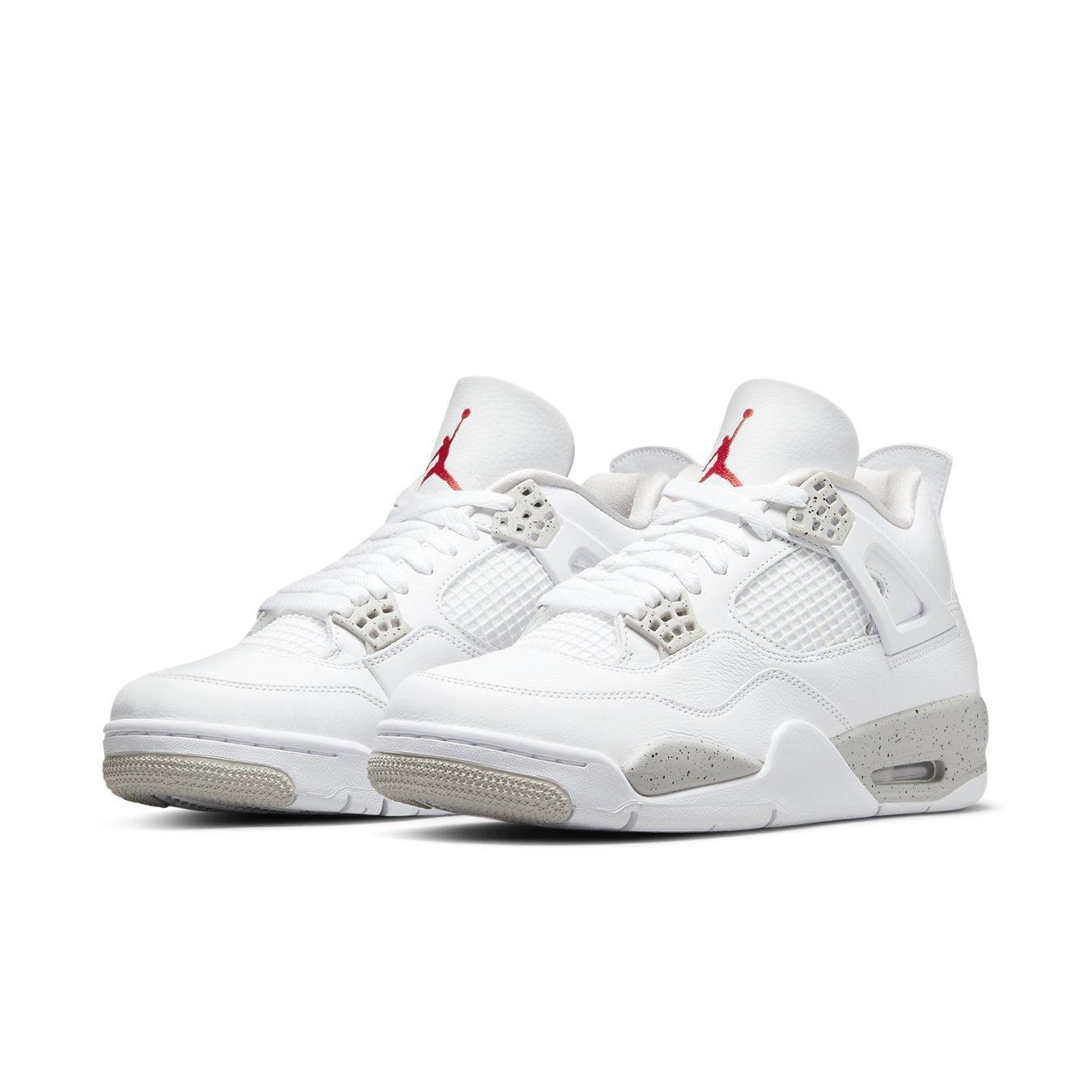 Air Jordan 4 Retro White Oreo 2021 in white leather with cement accents and red Jumpman logo.