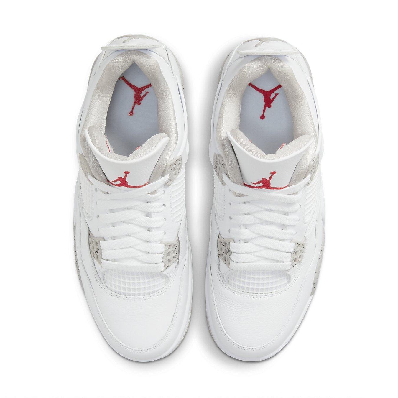 Air Jordan 4 Retro White Oreo 2021 with white leather, red Jumpman logo, and cement-inspired details on the upper.