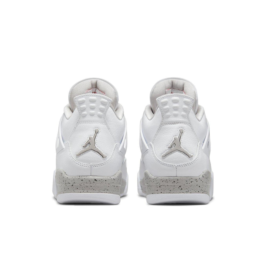 Air Jordan 4 Retro White Oreo 2021 sneakers, featuring a white leather upper and cement detailing on the heel.