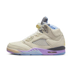 Jordan 5 Retro DJ Khaled We The Best Sail sneaker in cream leather with pastel accents and blue lining.