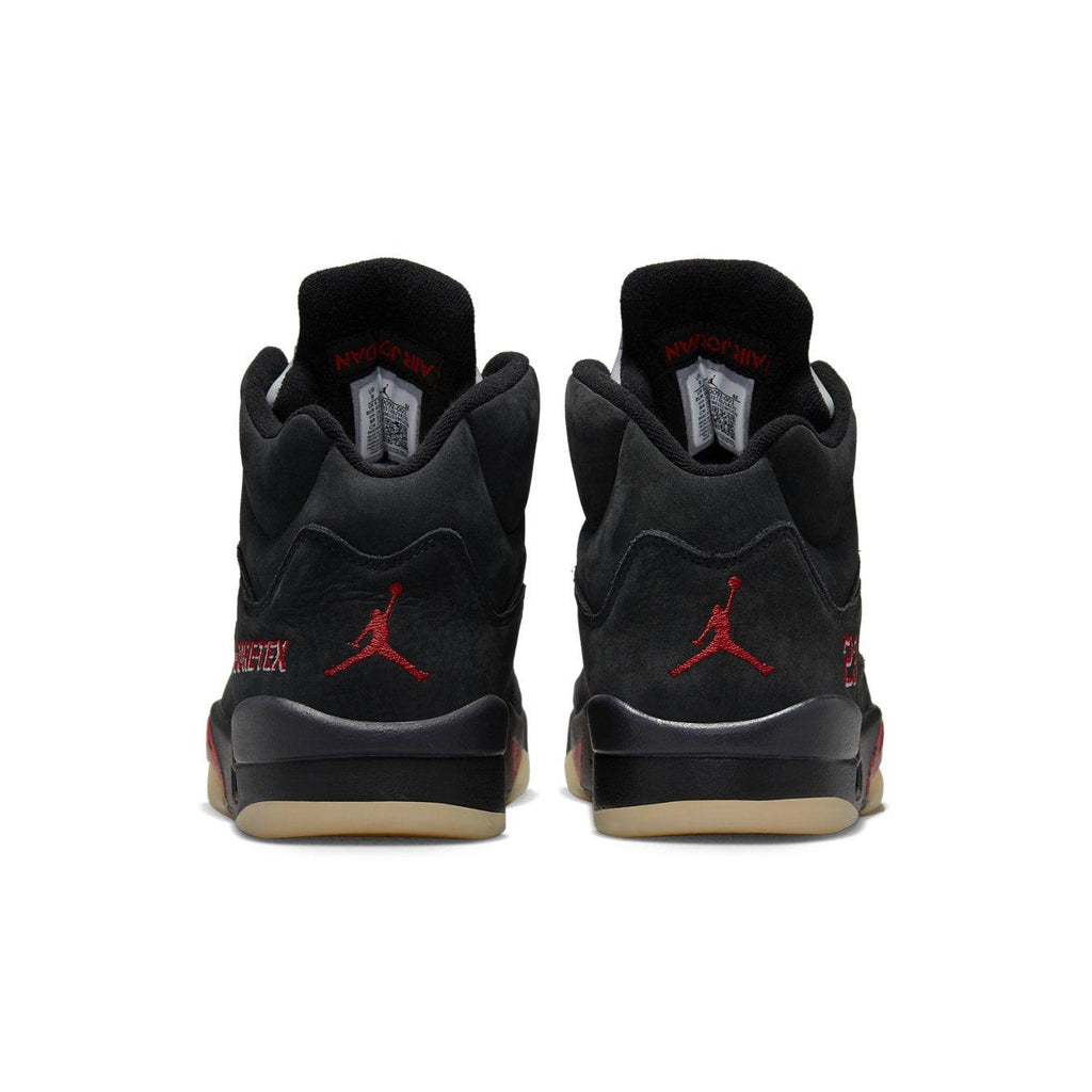 Rear view of women's Jordan 5 Retro Gore-Tex Off-Noir with red Jumpman logo and nubuck material.