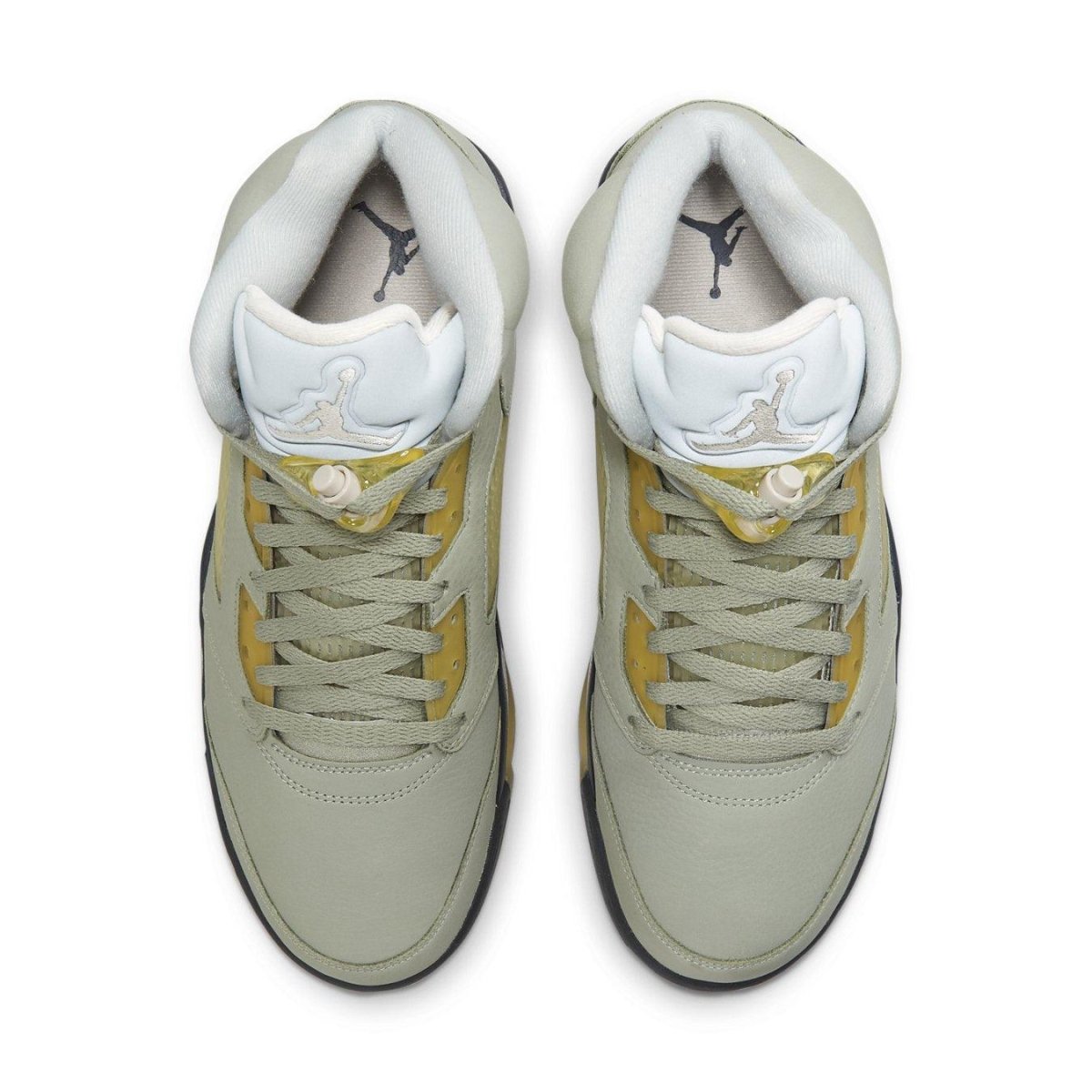 Top view of Air Jordan 5 Retro Jade Horizon sneakers featuring pale green suede and yellow accents.