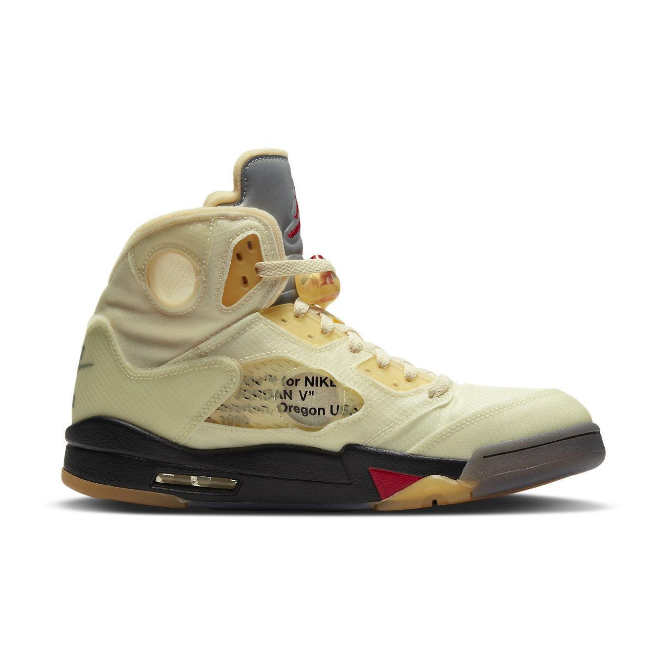 Jordan 5 Retro OFF-WHITE Sail sneaker in soft Sail tones with Fire Red accents and deconstructed design details.