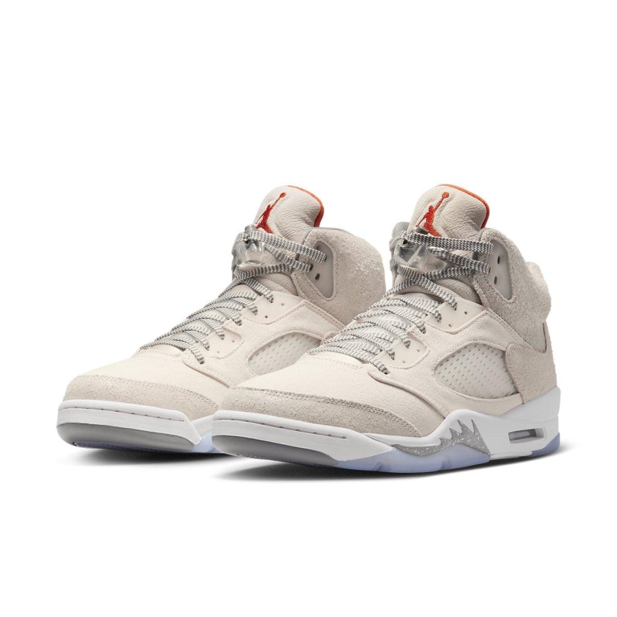 Jordan 5 Retro SE Craft Light Orewood Brown sneakers in beige with red accents and mesh detailing.