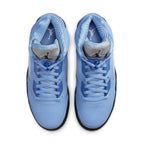 Top view of Air Jordan 5 Retro UNC University Blue sneakers showcasing pastel blue color and lace details.