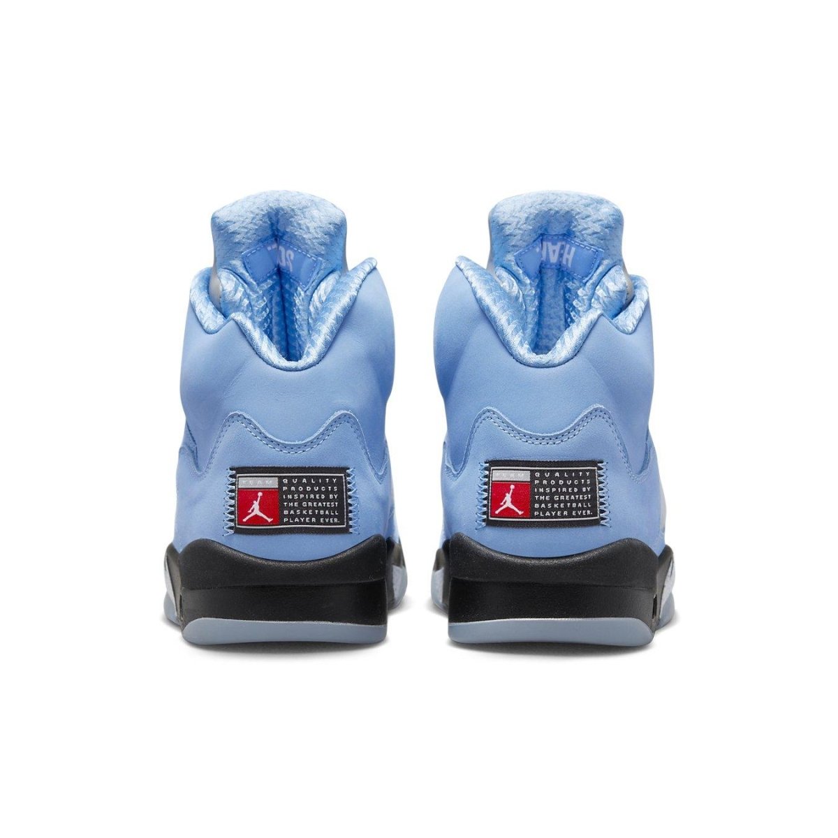 Rear view of Jordan 5 Retro UNC in University Blue with iconic Jumpman logo and reflective tongue.