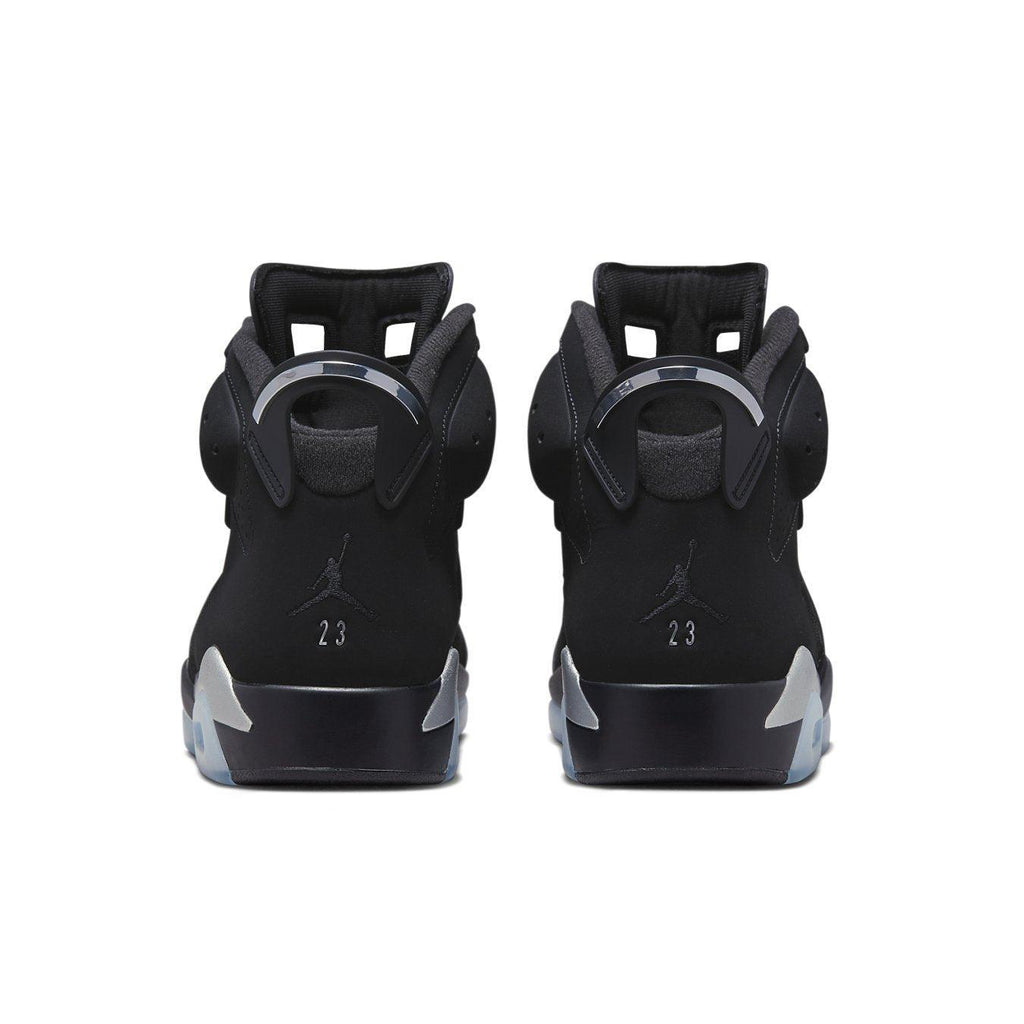 Retro Air Jordan 6 Chrome sneakers featuring black nubuck upper and Jumpman logo on the heel.