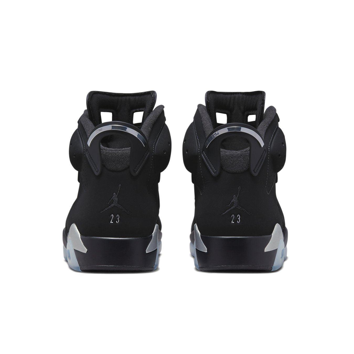 Retro Air Jordan 6 Chrome sneakers featuring black nubuck upper and Jumpman logo on the heel.
