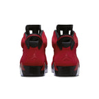 Rear view of Air Jordan 6 Retro 'Toro Bravo' sneakers in bold crimson suede with black accents.