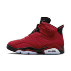 Air Jordan 6 Retro Toro Bravo in luxurious crimson suede with black detailing, showcasing a stylish athletic design.