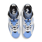 Jordan 6 Retro UNC White sneakers featuring classic white leather and University Blue nubuck upper.