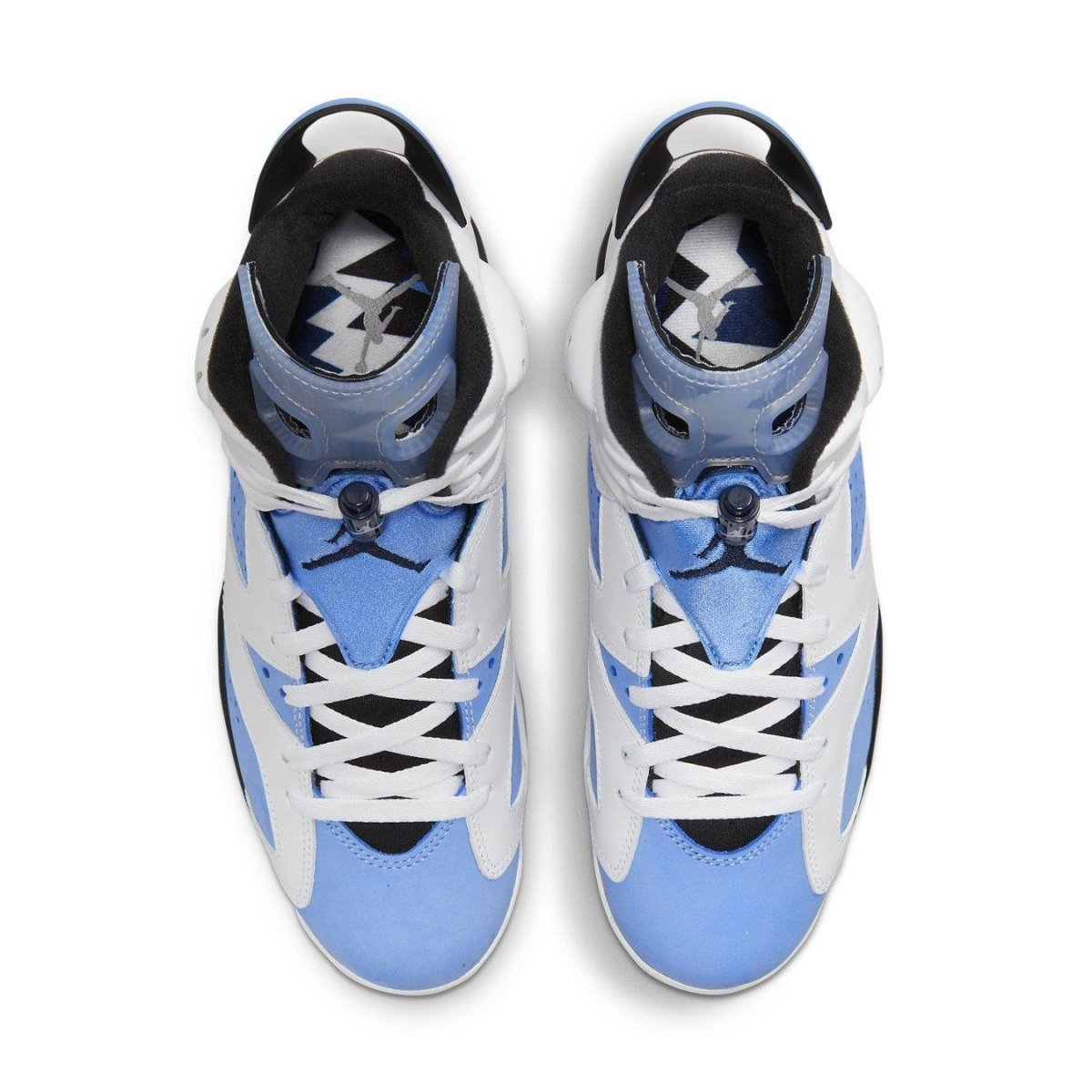 Jordan 6 Retro UNC White sneakers featuring classic white leather and University Blue nubuck upper.