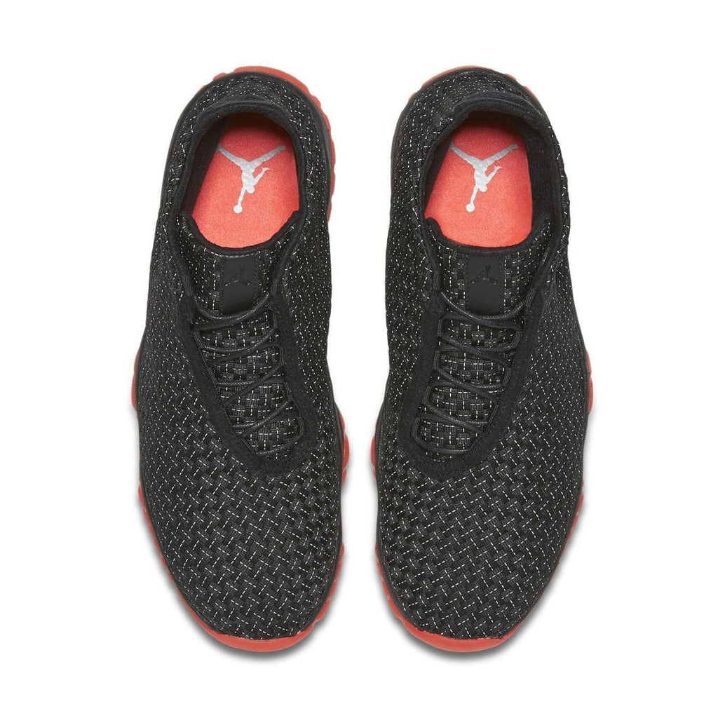 Jordan Future Premium Black Infrared 23 sneakers with black upper, red translucent sole, and carbon fiber plate.