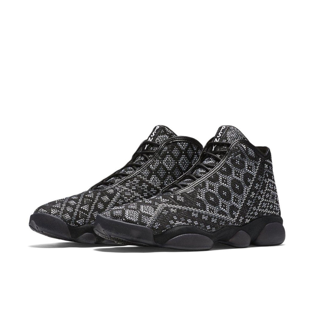Air Jordan Horizon PSNY sneakers featuring black mesh upper with white geometric patterns and black sole.