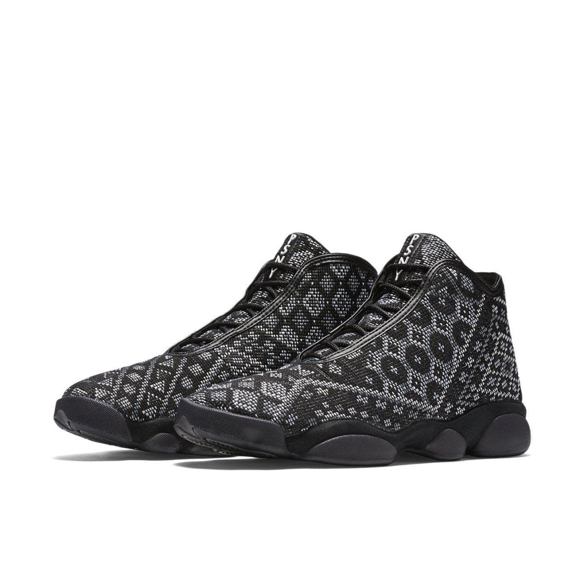 Air Jordan Horizon PSNY sneakers featuring black mesh upper with white geometric patterns and black sole.