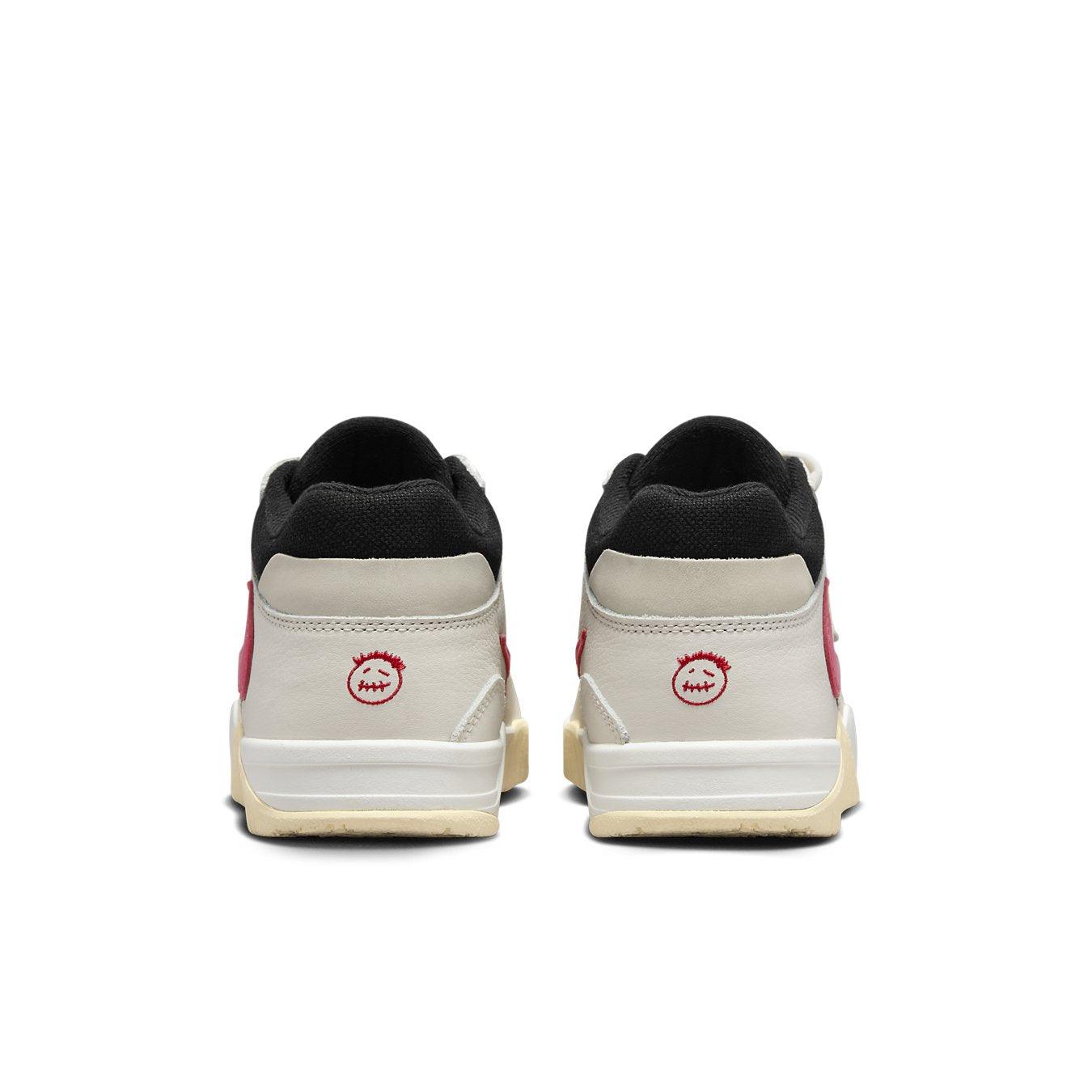 Back view of Jordan Jumpman Jack TR Travis Scott University Red shoes featuring contrasting black and ivory design.