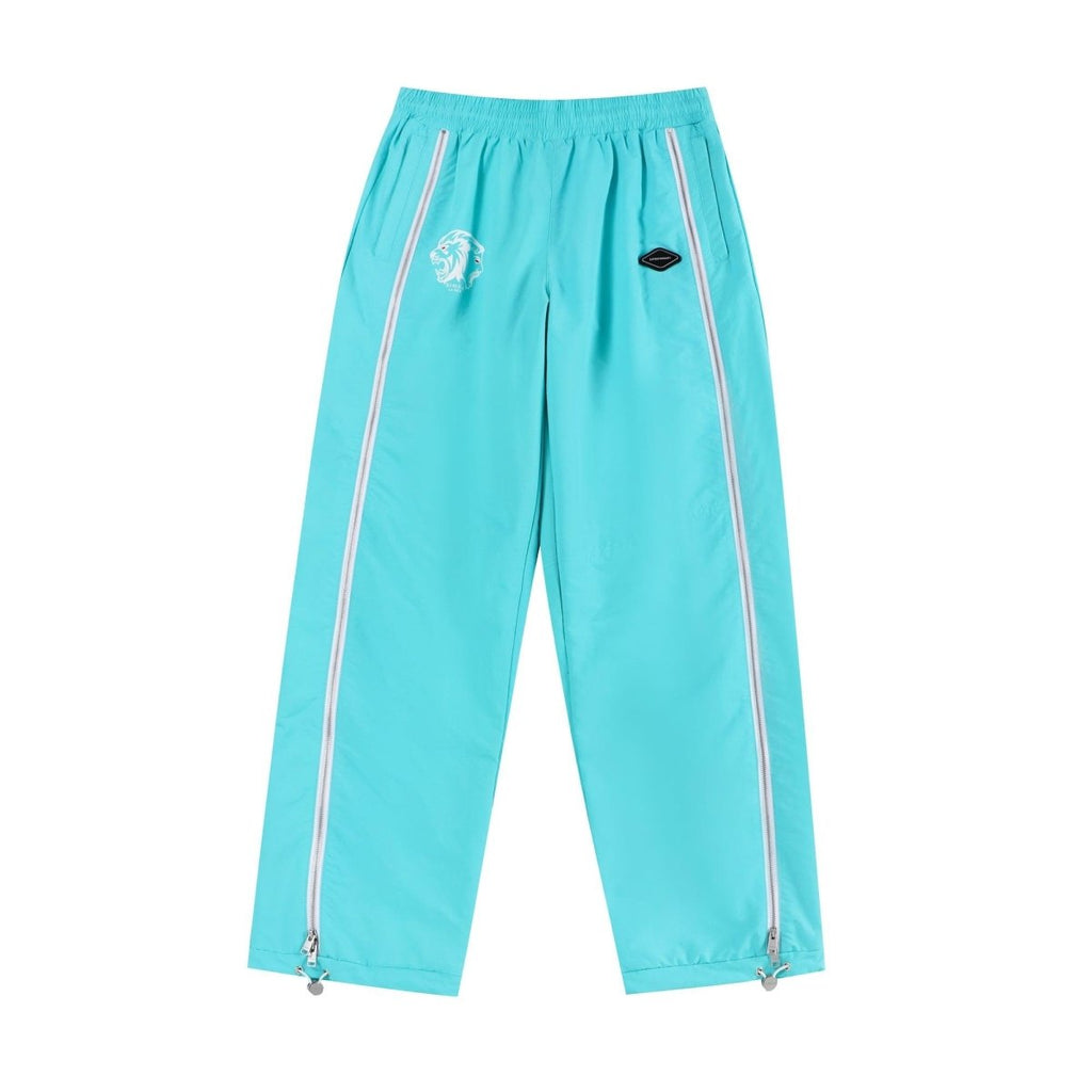 Mint and white NPT Simba La Rue zip track pants, featuring a relaxed fit and stylish design.