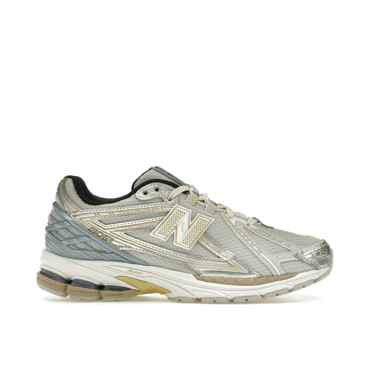 New Balance 1906R Kith White sneakers featuring breathable mesh and metallic overlays in silver and gold accents.