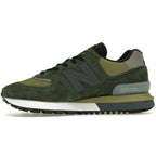 New Balance 574 Legacy Dark Green sneaker with ripstop and nubuck upper, stylish and robust design.