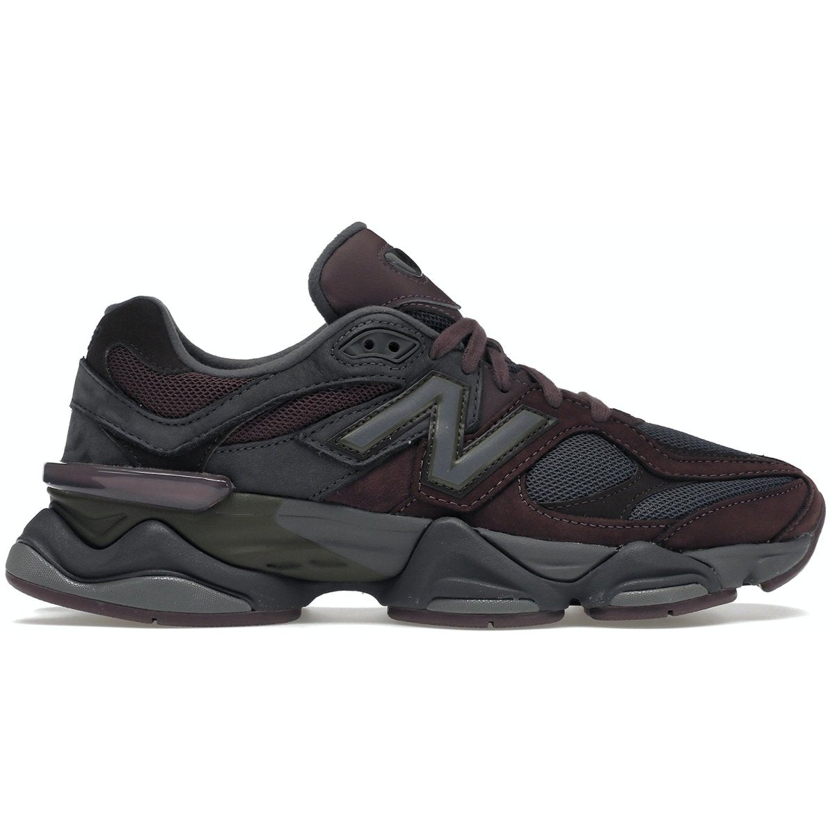 New Balance 9060 Truffle Rich Earth Magnet sneaker in dark shades, featuring a stylish design and comfortable fit.