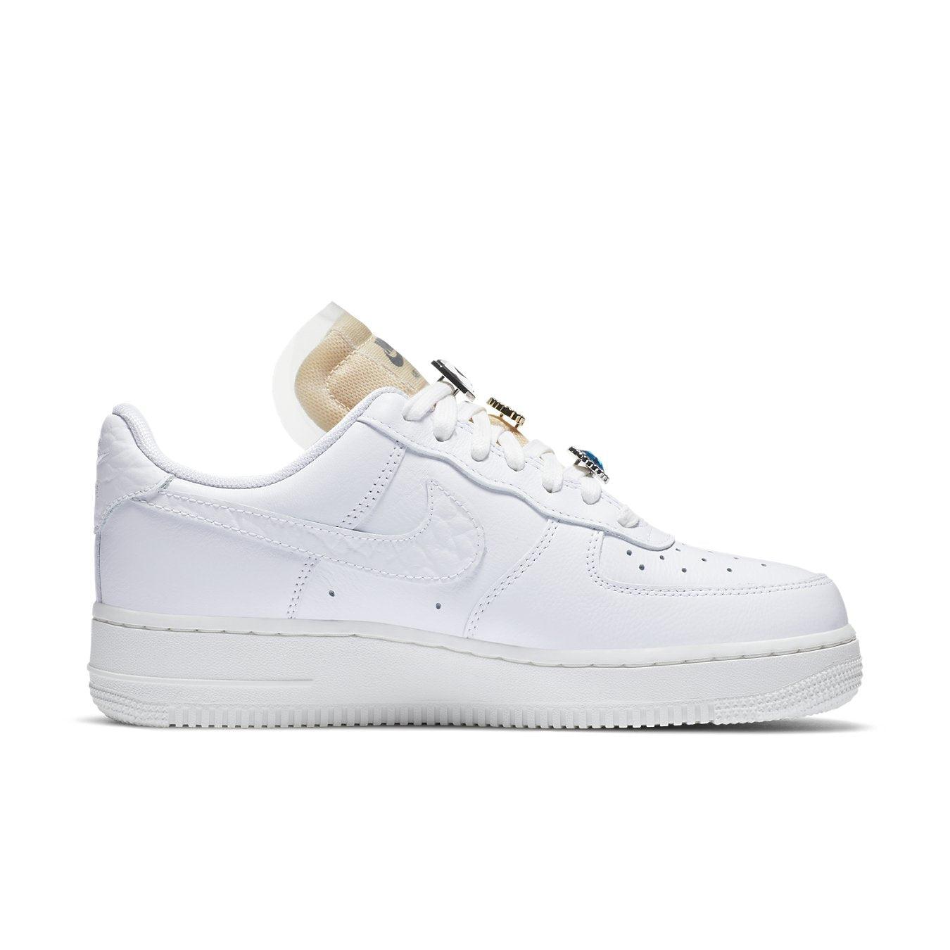 Nike Air Force 1 Low '07 LX Bling for women in white leather with textured Swoosh design.