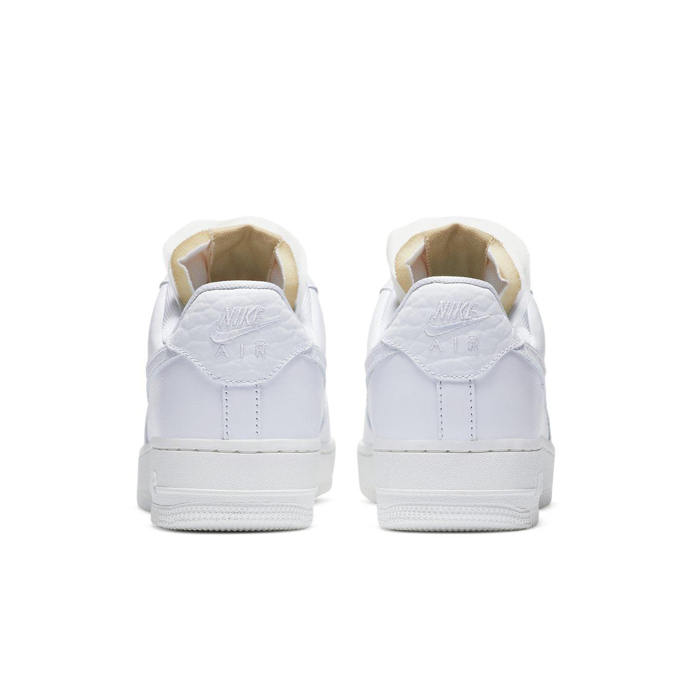 Back view of white Nike Air Force 1 Low '07 LX Bling sneakers for women, featuring a smooth leather design.