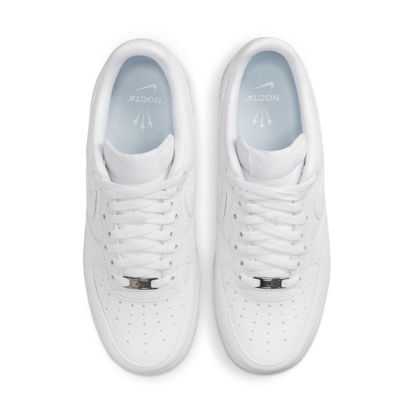 Nike Air Force 1 Low Drake NOCTA Certified Lover Boy, white leather sneakers with tonal Swoosh and NOCTA branding.