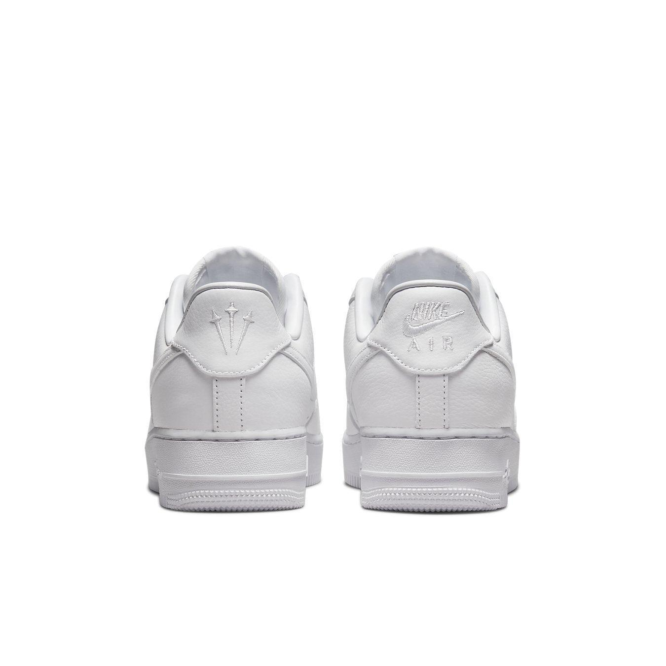 Nike Air Force 1 Low Drake NOCTA Certified Lover Boy sneakers back view, featuring a white leather upper and embossed logos.