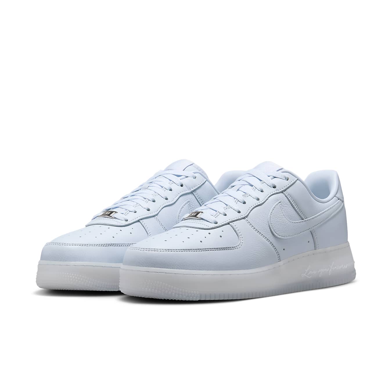 Nike Air Force 1 Low in pale blue leather with classic design and iconic Swoosh branding.
