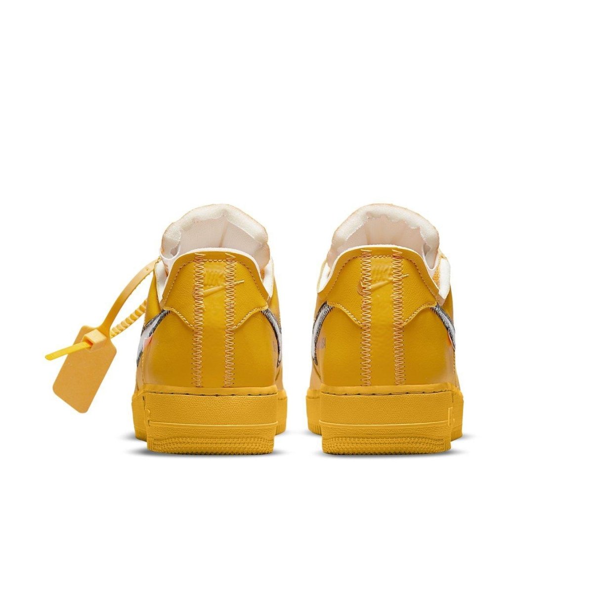 Back view of Nike Air Force 1 Low Off-White ICA University Gold sneakers with yellow leather and silver Swoosh.