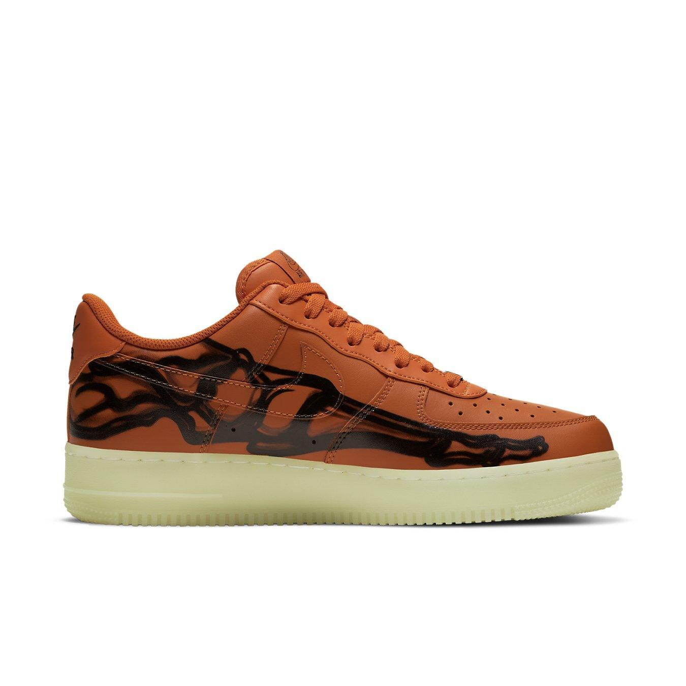 Nike Air Force 1 Low Orange Skeleton Halloween 2020 sneaker with a skeleton design on orange leather.