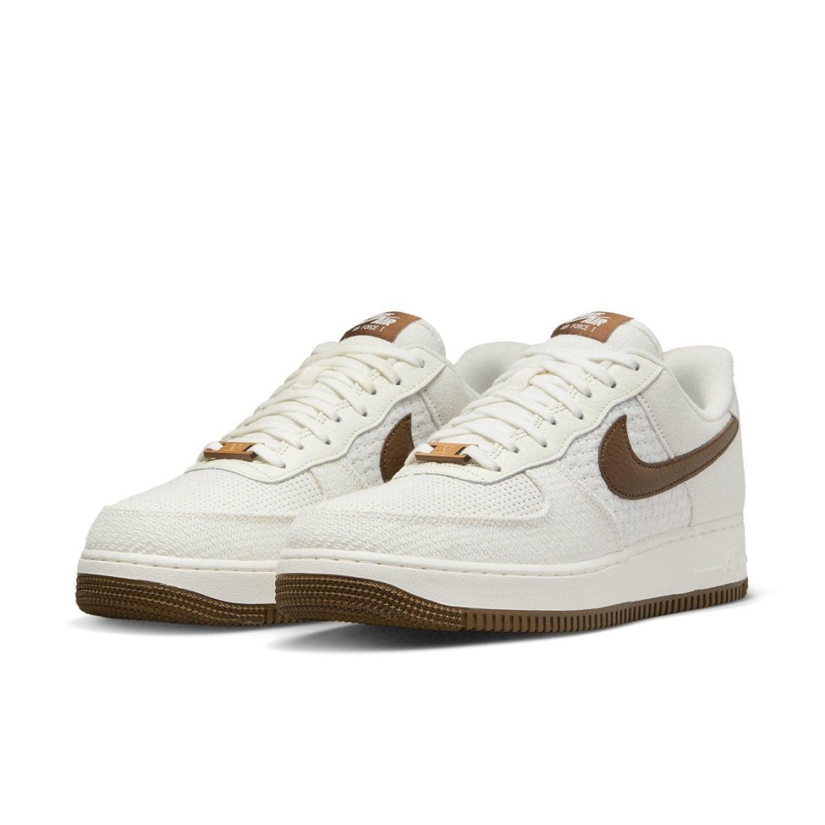 Nike Air Force 1 Low SNKRS Day 5th Anniversary sneakers in white with brown accents, stylish and collectible footwear.