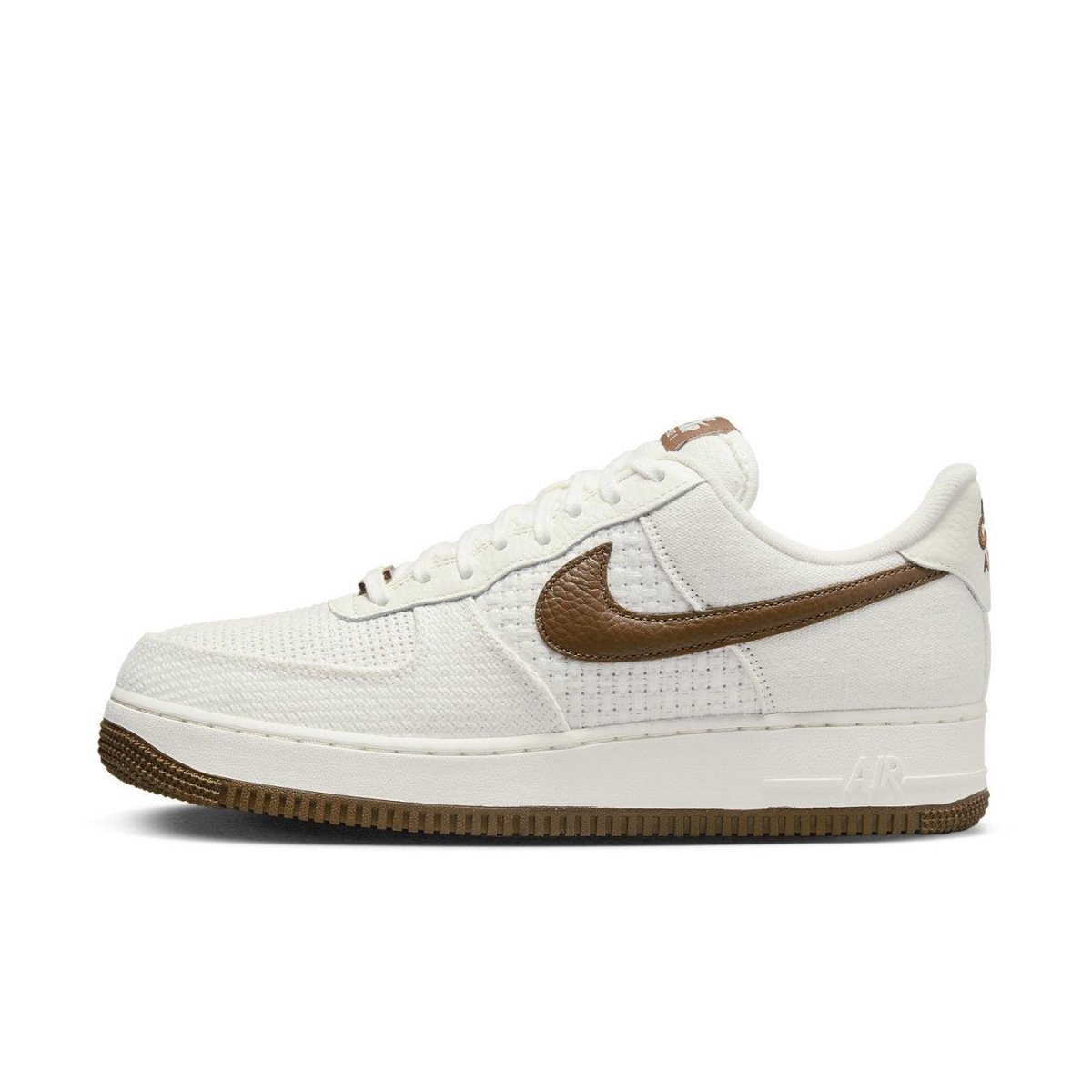 Nike Air Force 1 Low SNKRS Day 5th Anniversary in white with brown accents, showcasing classic sneaker style.