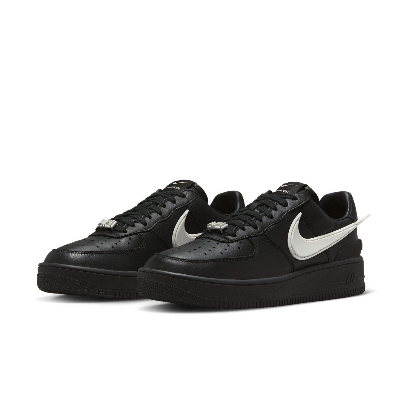 Nike Air Force 1 Low SP AMBUSH in black leather with contrasting white Swoosh and co-branding details.