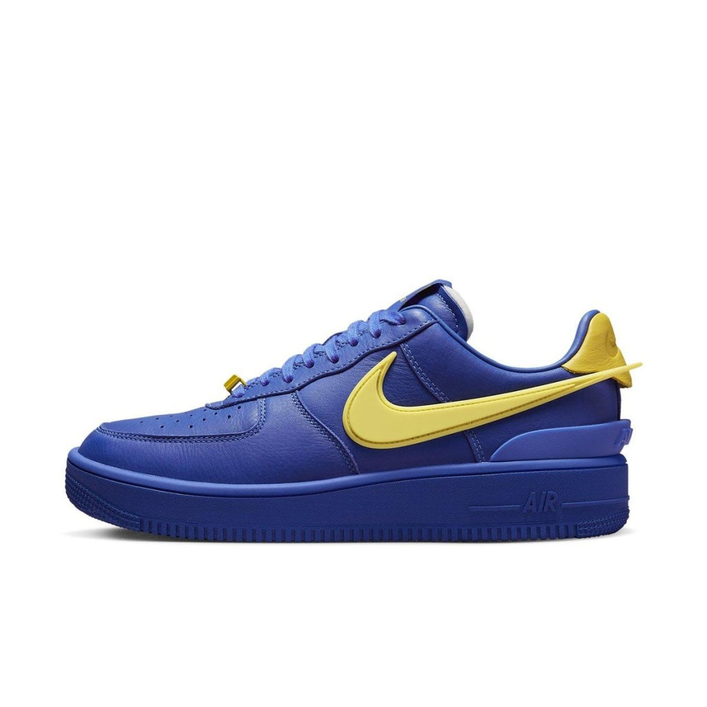 Nike Air Force 1 Low SP AMBUSH in Game Royal blue and yellow, showcasing a sleek design and stylish silhouette.