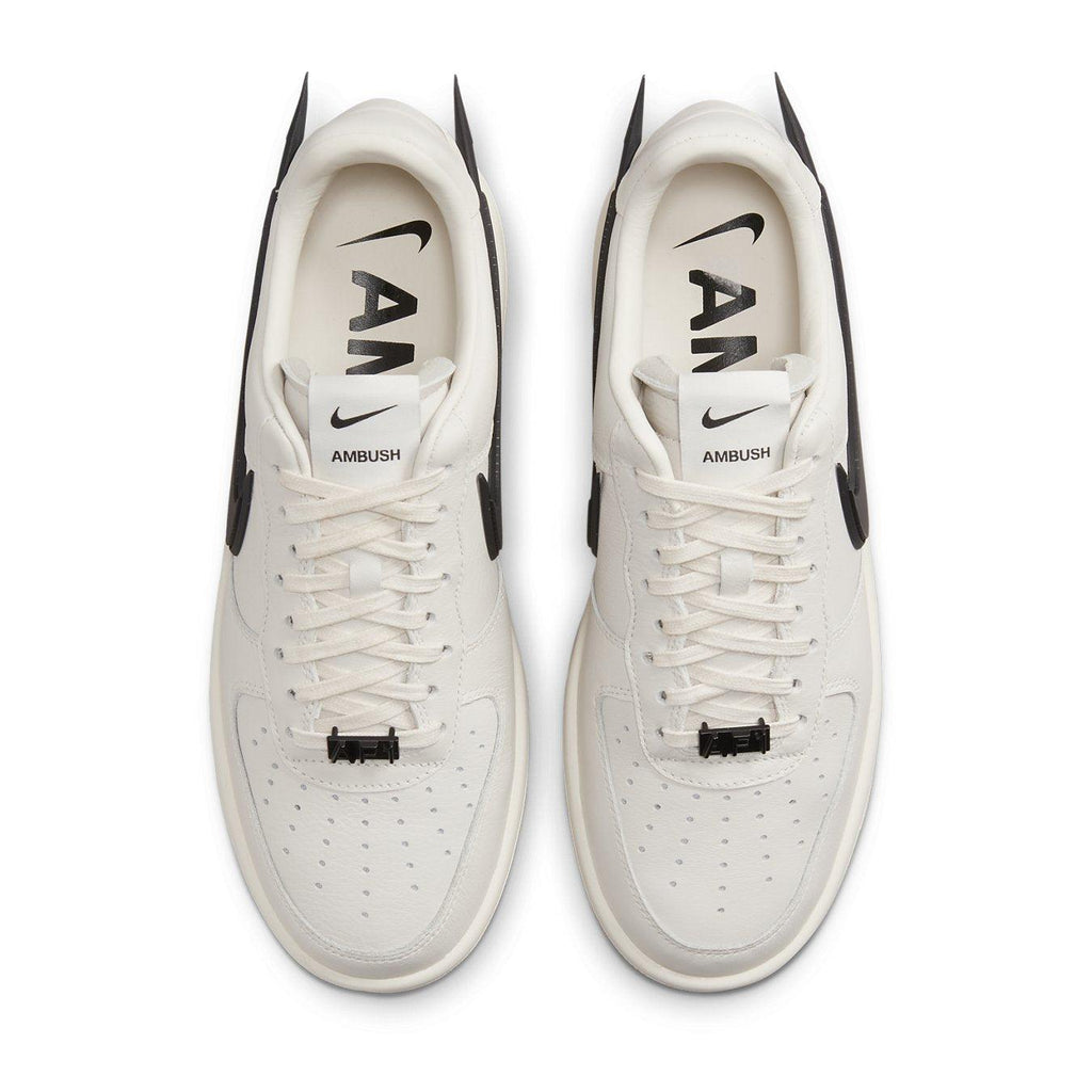 Nike Air Force 1 Low SP AMBUSH Phantom sneakers with unique design and AMBUSH branding in white and black.